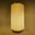 Lampe LED en papier pliable Coollux Aurora Tall sur base en bois, 32cm - Nature